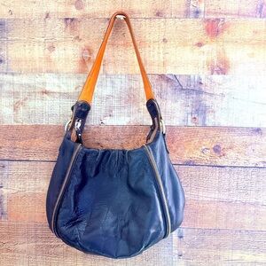 Hobo International Black and Tan Leather Hobo Crescent Shoulder Bag